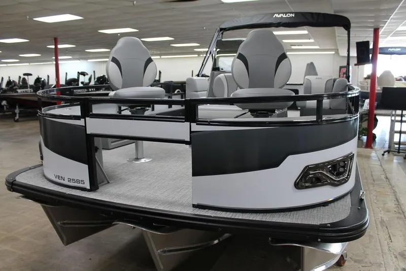 Slide: The Image of 2025 Avalon Venture 85 Center Console Fish 25 FT boat in showroom, featuring sleek design. - 6