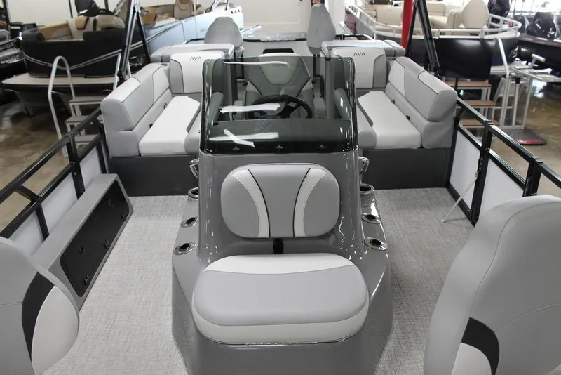 Slide: The Image of 2025 Avalon Venture 85 Center Console Fish boat interior with modern seating and console design. - 7