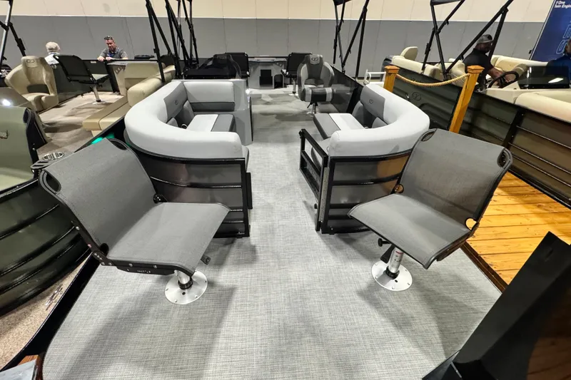 Slide: The Image of 2026 Veranda Vista 22F2+2 pontoon boat interior with modern seating arrangement. - 2