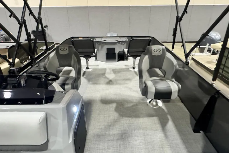 Slide: The Image of 2026 Veranda Vista 22F2+2 pontoon boat interior with modern seating and steering console. - 4