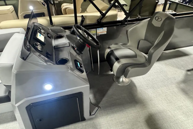 Slide: The Image of Captain's seat and console of 2026 Veranda Vista 22F2+2 pontoon boat, featuring modern controls. - 5