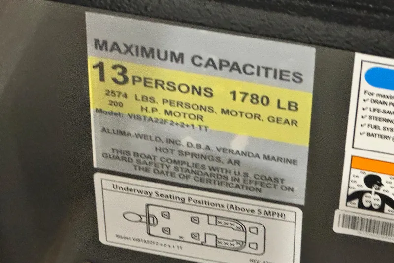 Slide: The Image of 2026 Veranda Vista 22F2+2 boat capacity label, 13 persons, 1780 lbs, 200 HP motor. - 7