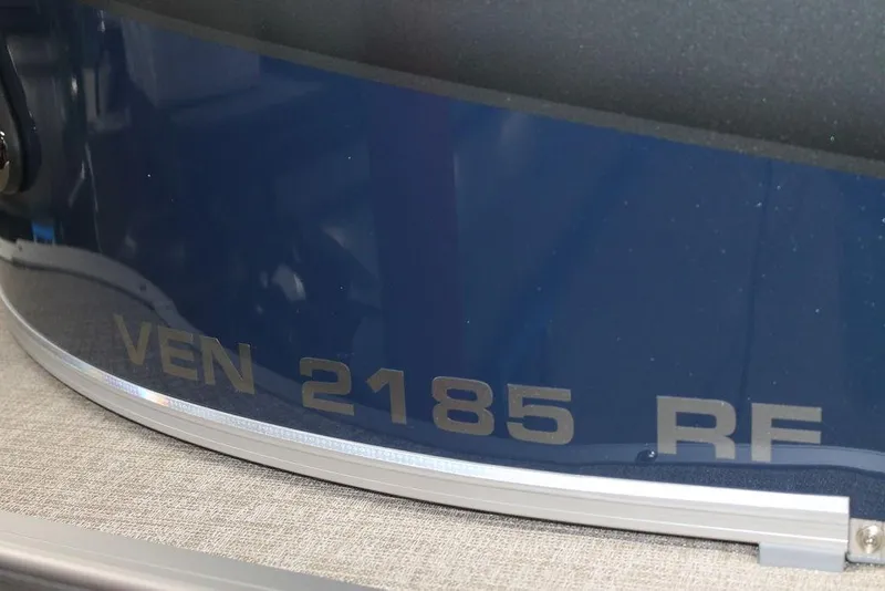 Slide: The Image of 2025 Avalon Venture 85 Quad Fish 21 FT boat, blue exterior with model number VEN 2185 RF. - 4