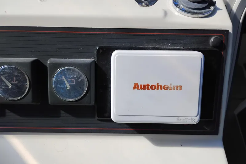 Slide: The Image of Dashboard of 1989 Bayliner 4588 Pilothouse with Autohelm and gauges. - 12