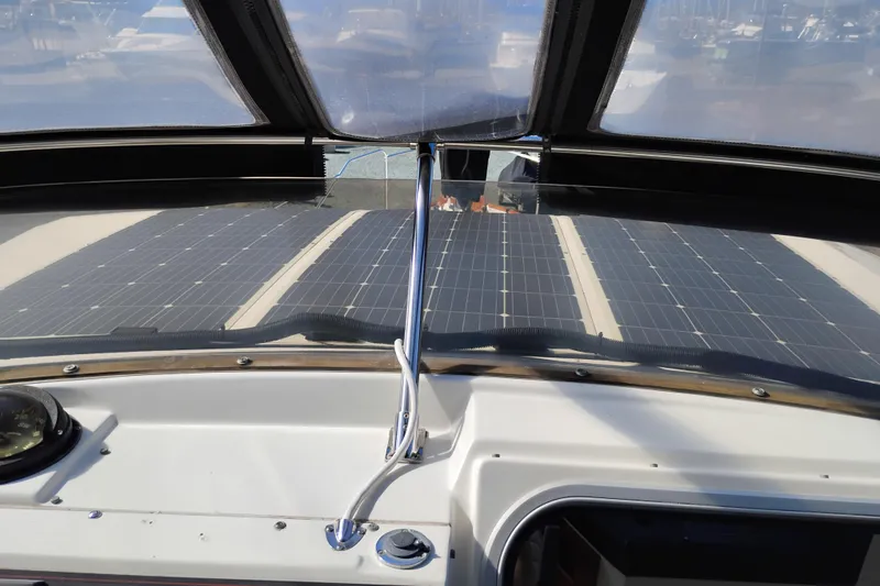 Slide: The Image of 1989 Bayliner 4588 Pilothouse with solar panels on deck, viewed from cockpit. - 15