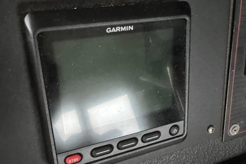 Slide: The Image of Garmin display on 1989 Bayliner 4588 Pilothouse Motor Yacht dashboard. - 21