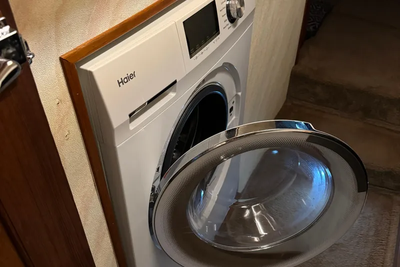 Slide: The Image of Haier washing machine with open door inside 1989 Bayliner 4588 Pilothouse Motor Yacht. - 43