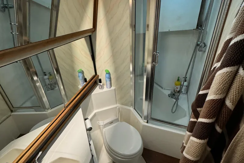 Slide: The Image of Bathroom of 1989 Bayliner 4588 Pilothouse Motor Yacht with shower and toilet. - 46