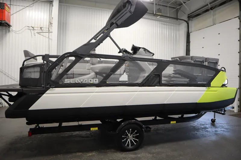 Slide: The Image of 2024 Sea-Doo Switch Sport/Cruise 21, 230 hp, in a garage setting. - 10