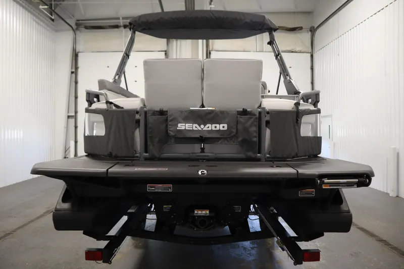 Slide: The Image of 2024 Sea-Doo Switch Sport/Cruise 21, 230 hp, sleek design, vibrant colors, indoor display. - 12