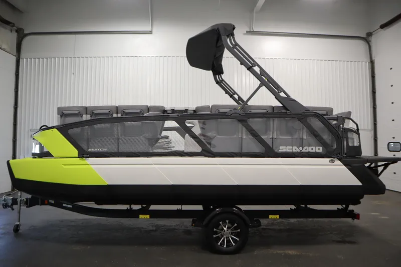 Slide: The Image of 2024 Sea-Doo Switch Sport/Cruise 21, 230 hp, in a garage setting. - 14