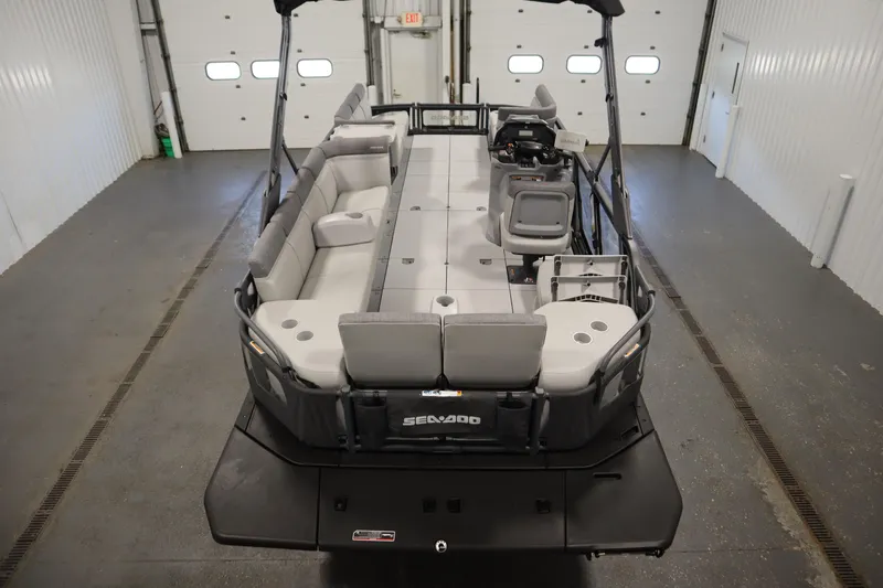 Slide: The Image of 2024 Sea-Doo Switch Sport/Cruise 21, 230 hp, in a garage setting. - 16