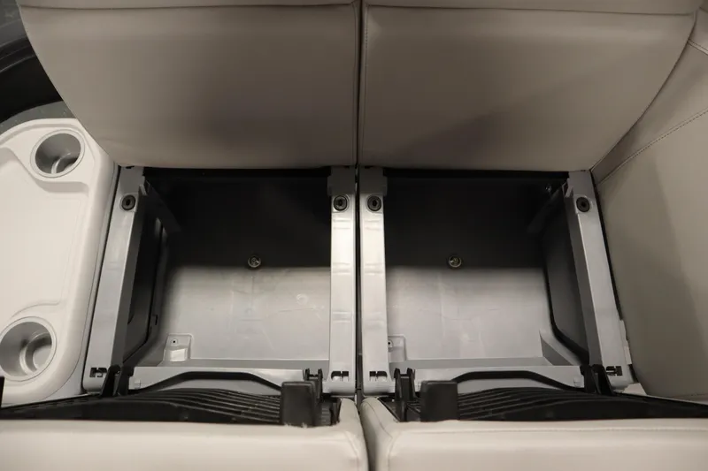 Slide: The Image of 2024 Sea-Doo Switch Sport/Cruise 21 interior seating with cup holders, gray upholstery. - 21