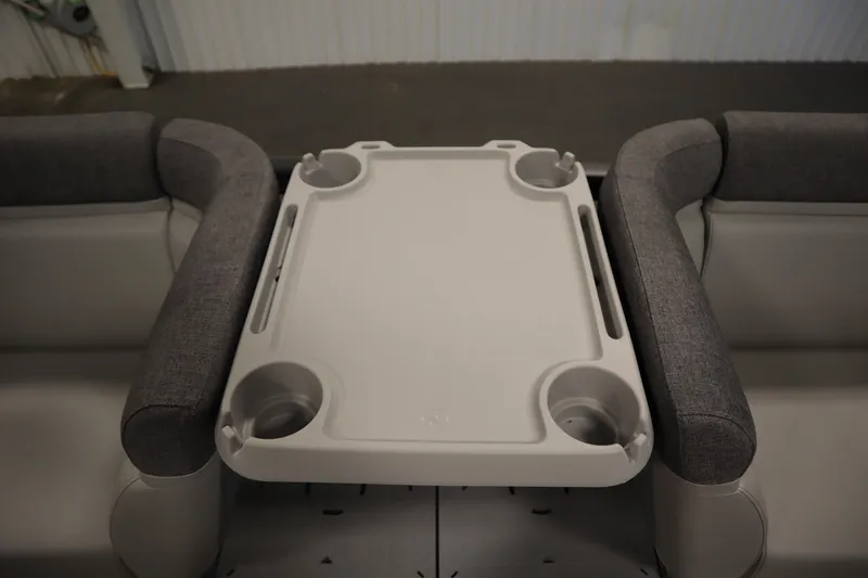 Slide: The Image of 2024 Sea-Doo Switch Sport/Cruise 21 interior with table and cup holders. - 22