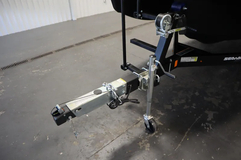 Slide: The Image of 2024 Sea-Doo Switch Sport/Cruise 21 storage compartment with open lid, showcasing interior space. - 48