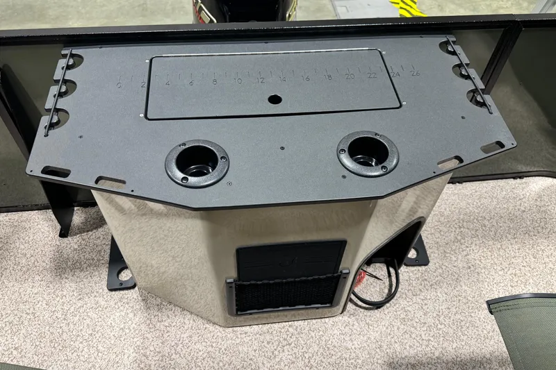 Slide: The Image of 2026 Veranda Vista 20F4 boat console with cup holders and measurement markings. - 11