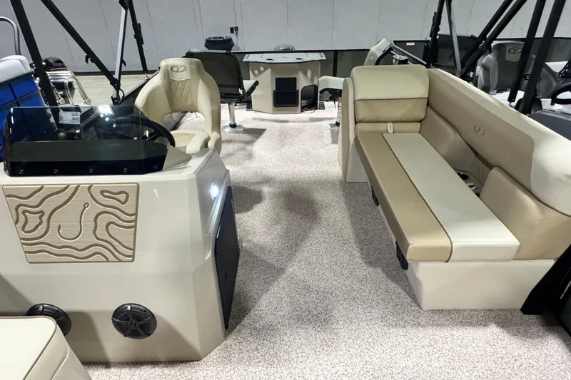 Slide: The Image of Luxurious interior of 2026 Veranda Vista 20F4 pontoon boat with beige seating and modern design. - 6