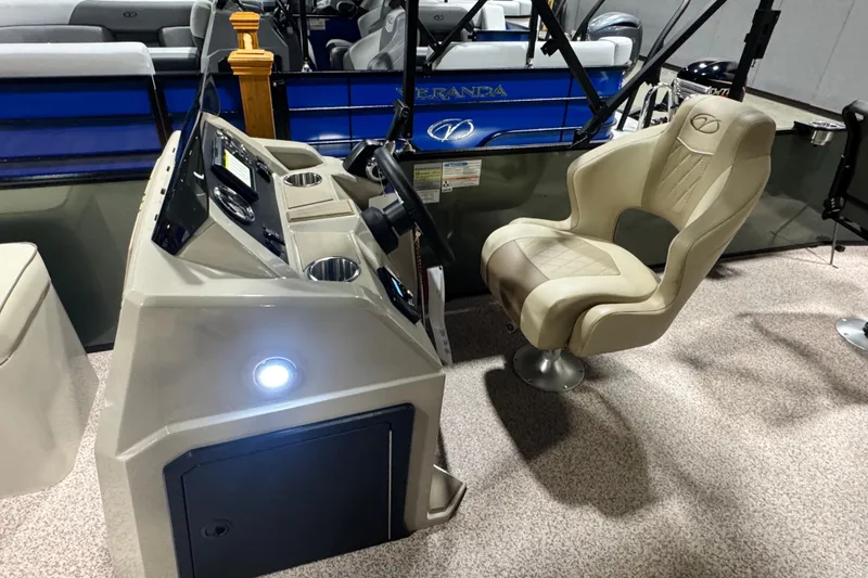 Slide: The Image of 2026 Veranda Vista 20F4 boat interior with captain's chair and control panel. - 7