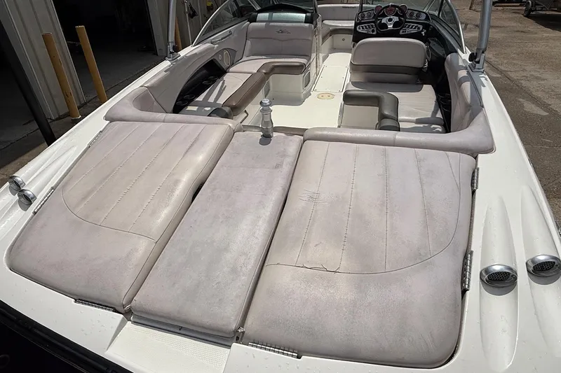 Slide: The Image of 2006 MasterCraft X45 boat interior with spacious seating and modern dashboard. - 10