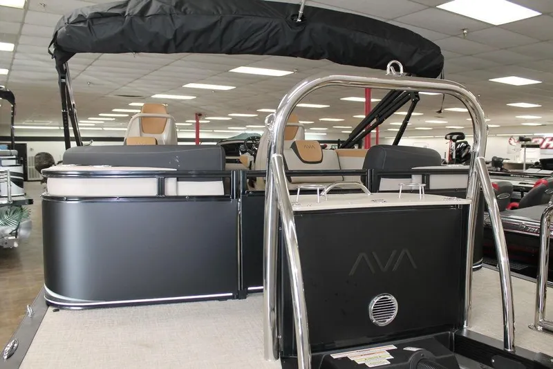 Slide: The Image of 2025 Avalon LSZ Quad Lounger 23 FT pontoon boat interior with sleek seating and modern design. - 6