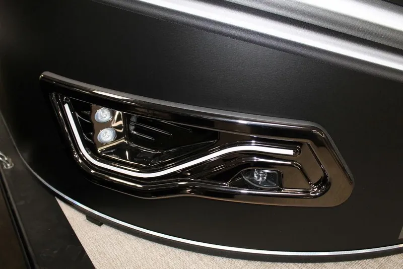 Slide: The Image of 2025 Avalon LSZ Quad Lounger 23 FT, sleek black exterior with modern lighting design. - 9