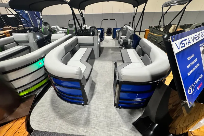Slide: The Image of 2026 Veranda Vista View 20RC pontoon boat with modern seating and stylish design. - 2