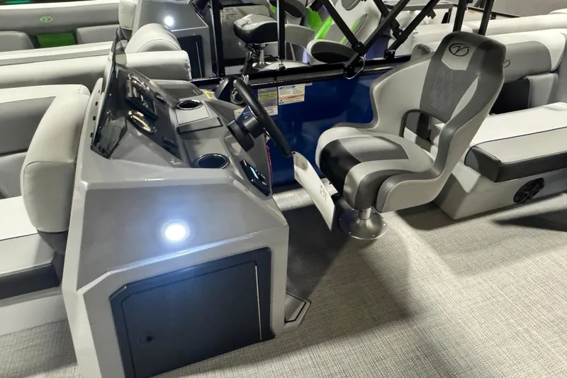 Slide: The Image of 2026 Veranda Vista View 20RC boat interior with modern helm and comfortable seating. - 5
