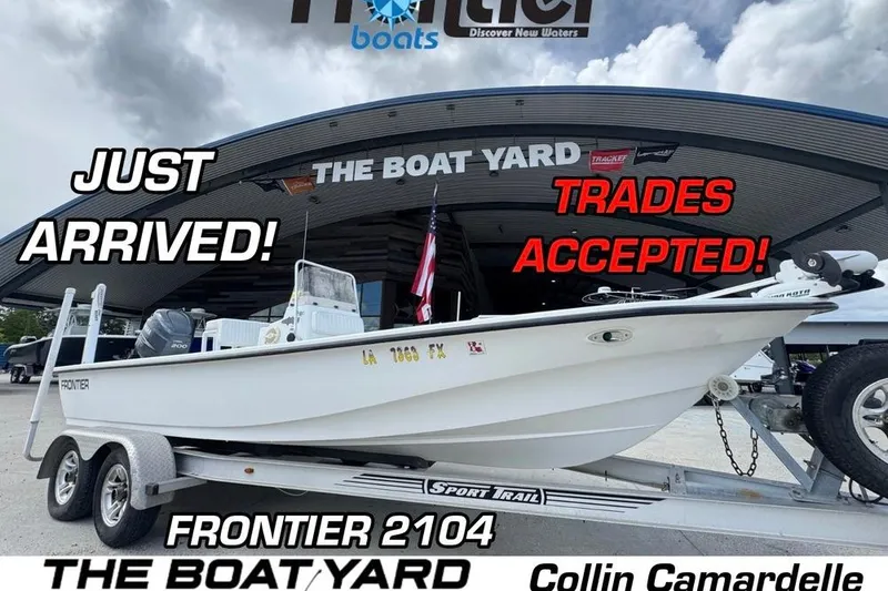 The Image of 2011 Frontier 2104 boat at dealership, trades accepted, just arrived, on trailer. - 1
