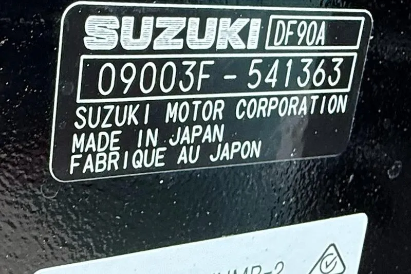 Slide: The Image of Label on Suzuki DF90A engine, serial 09003F-541363, made in Japan. Hurricane SS185-OB 2026. - 12
