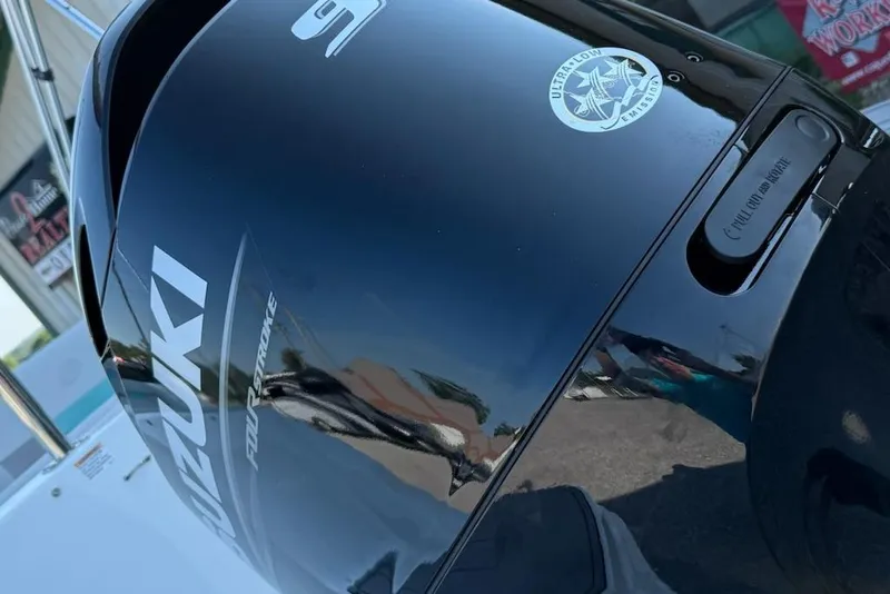 Slide: The Image of Close-up of a Suzuki outboard motor on a 2026 Hurricane SS185-OB boat. - 3