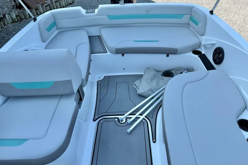 Slide: The Image of 2026 Hurricane SS185-OB boat interior with white and teal seating, spacious layout, and modern design. - 8