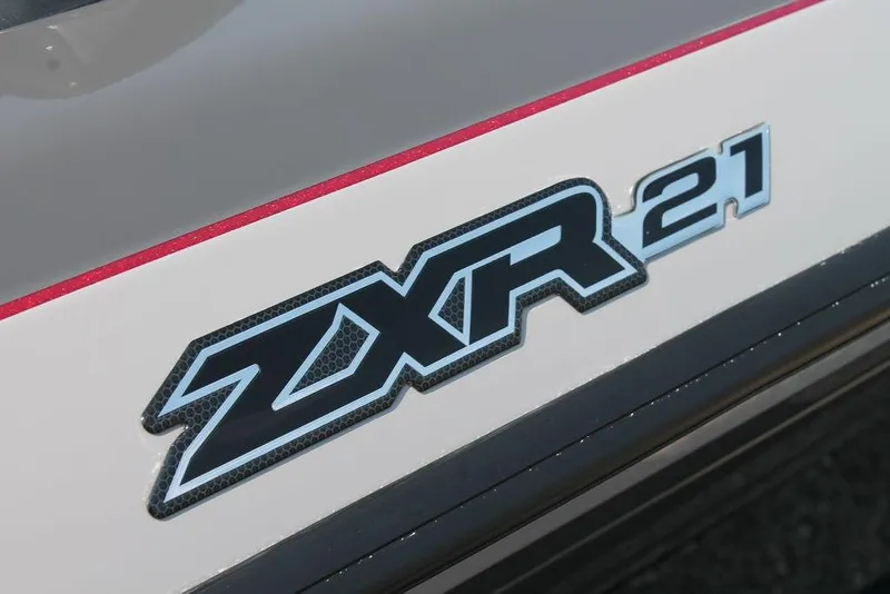 Slide: The Image of Close-up of 2025 Skeeter ZXR21 model logo on a sleek surface. - 4