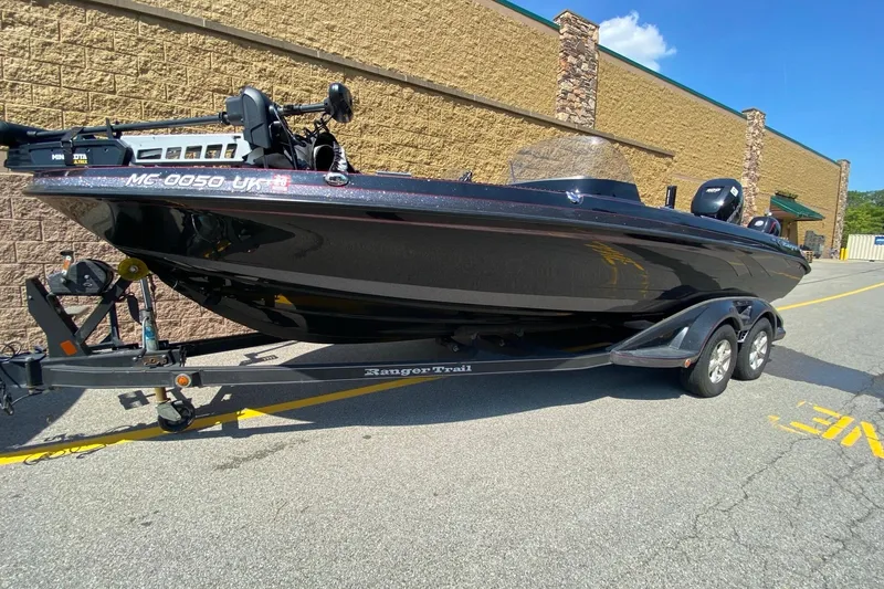 The Image of 2017 Ranger 621FS Fisherman boat on trailer, parked outdoors. - 0