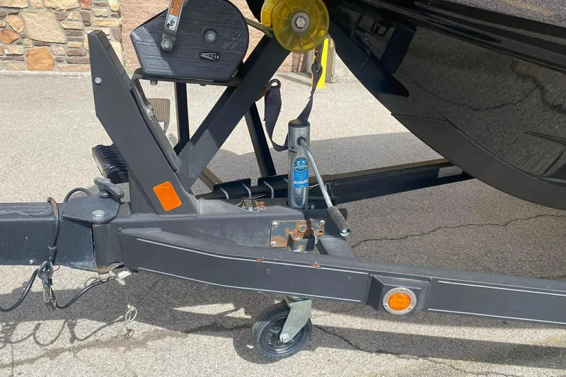 Slide: The Image of Trailer hitch of a 2017 Ranger 621FS Fisherman boat on pavement. - 11