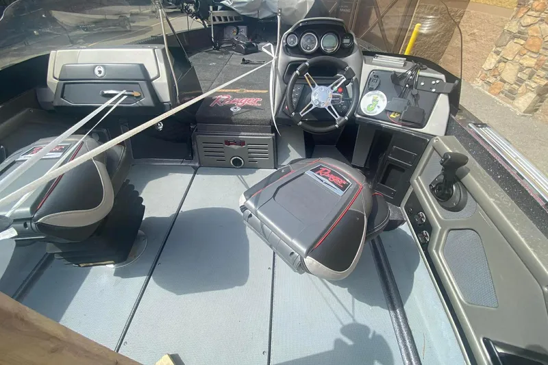 Slide: The Image of 2017 Ranger 621FS Fisherman boat interior with steering wheel and seating. - 15