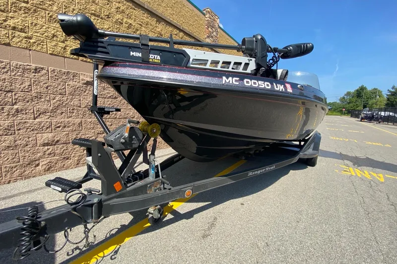 Slide: The Image of 2017 Ranger 621FS Fisherman boat on trailer, parked outdoors on sunny day. - 7