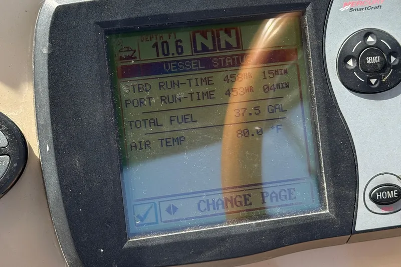 Slide: The Image of Display screen on a 2005 Sea Ray 300 Sundancer showing vessel status and fuel data. - 38