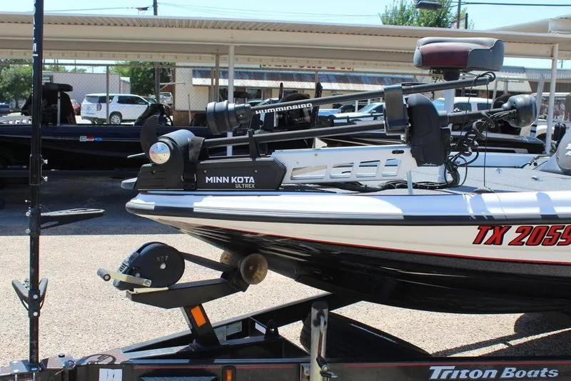 Slide: The Image of 2008 Triton Tr21 X boat with Minn Kota Ultrex motor on trailer. - 6
