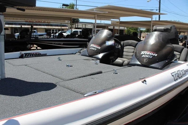 Slide: The Image of 2008 Triton Tr21 X boat with dual consoles and spacious deck. - 8