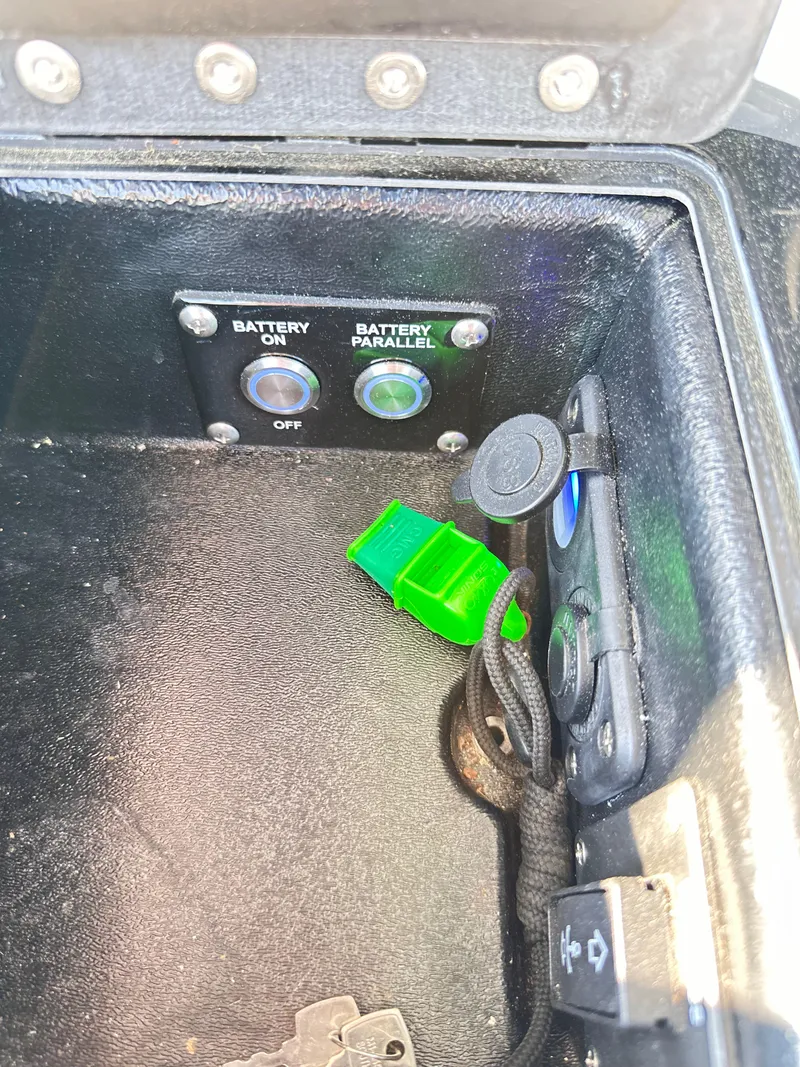 Slide: The Image of 2023 Statement 350 Open boat with JL Audio control panel and chrome handle. - 26