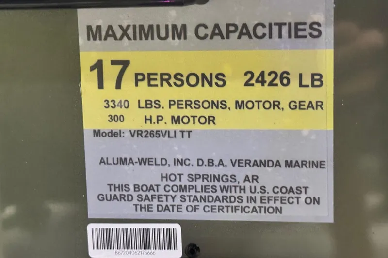 Slide: The Image of 2026 Veranda Relax VR265VLI boat capacity label: 17 persons, 2426 lbs, 300 HP motor. - 11