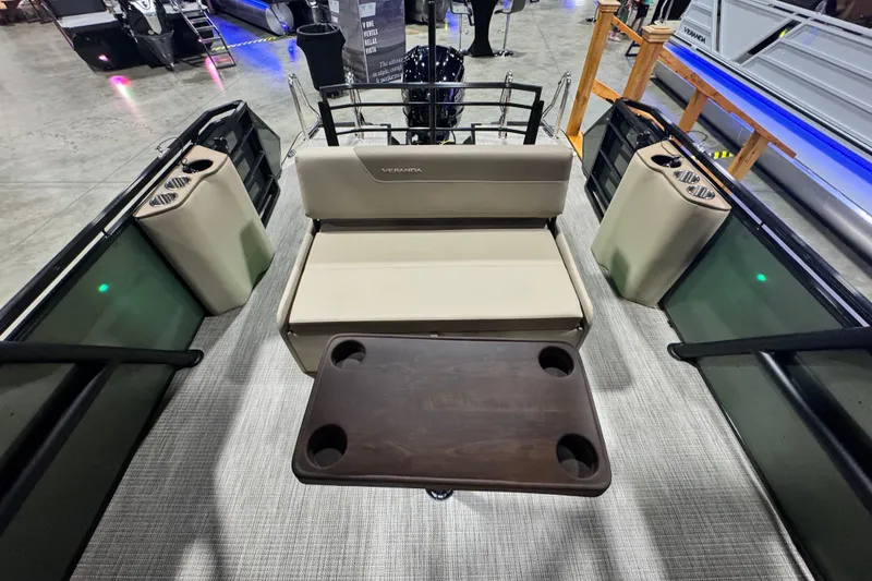 Slide: The Image of 2026 Veranda Relax VR265VLI pontoon boat interior with seating and cup holders. - 12