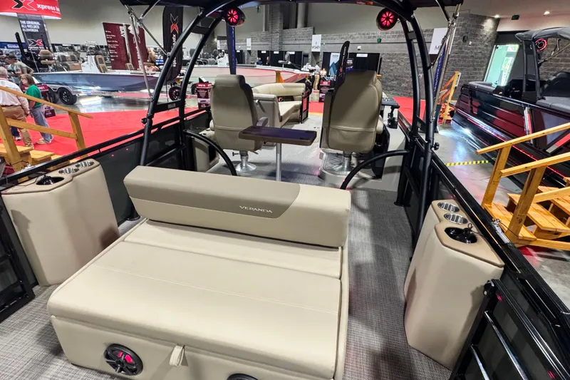 Slide: The Image of 2026 Veranda Relax VR265VLI pontoon boat interior at a boat show. - 15
