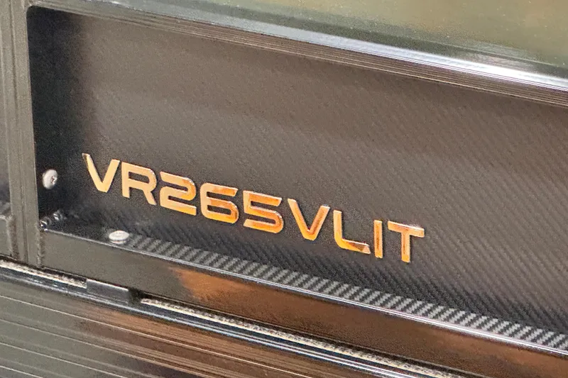 Slide: The Image of Close-up of Veranda Relax VR265VLI 2026 model badge on a sleek surface. - 3