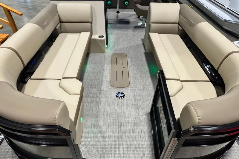 Slide: The Image of 2026 Veranda Relax VR265VLI pontoon boat interior with beige seating and modern design. - 5