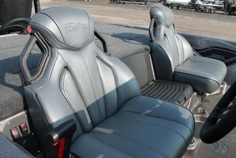 Slide: The Image of 2025 Skeeter ZXR21 boat interior with sleek, modern seats and detailed stitching. - 8