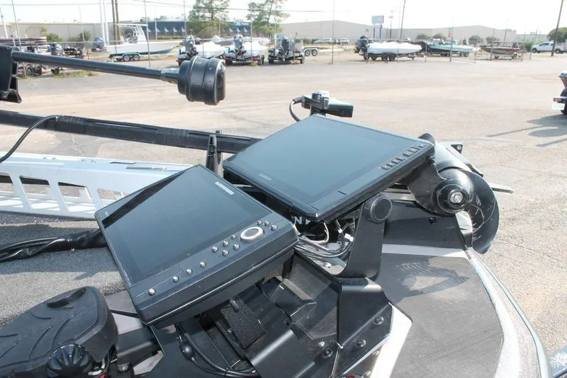 Slide: The Image of 2025 Skeeter ZXR21 boat with advanced navigation and control systems. - 9