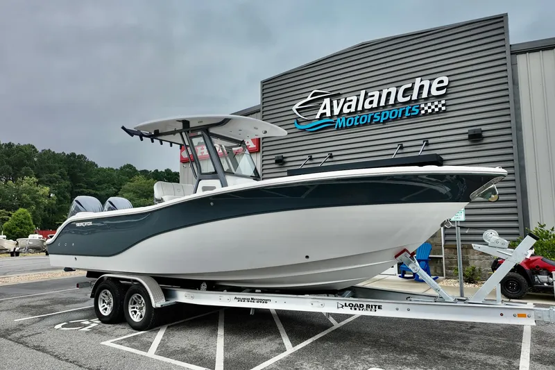 The Image of 2026 Sea Fox 268 Commander boat on trailer at Avalanche Motorsports dealership. - 1