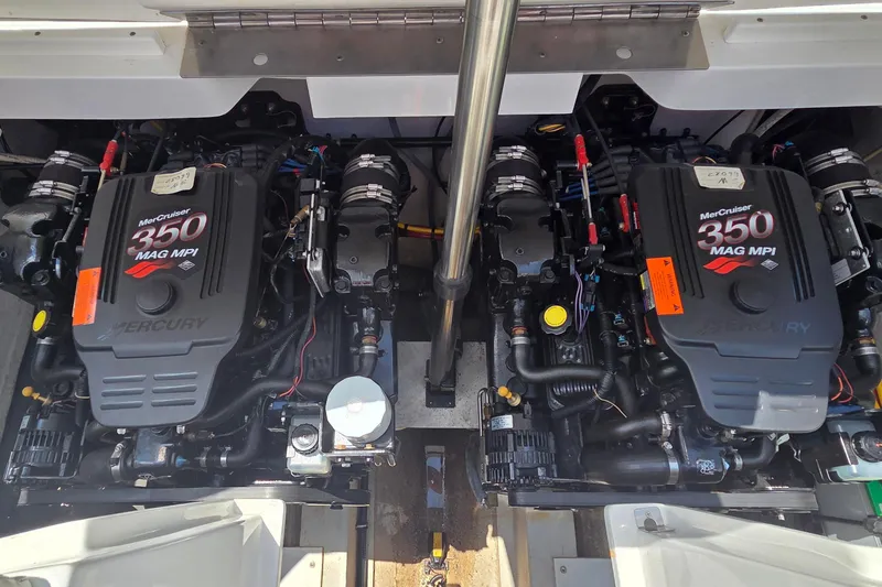 Slide: The Image of Twin MerCruiser 350 MAG MPI engines in a 2003 Cobalt 282 boat. - 13