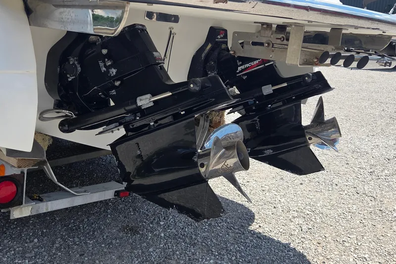 Slide: The Image of 2003 Cobalt 282 boat with dual MerCruiser outdrives and stainless steel propellers. - 14